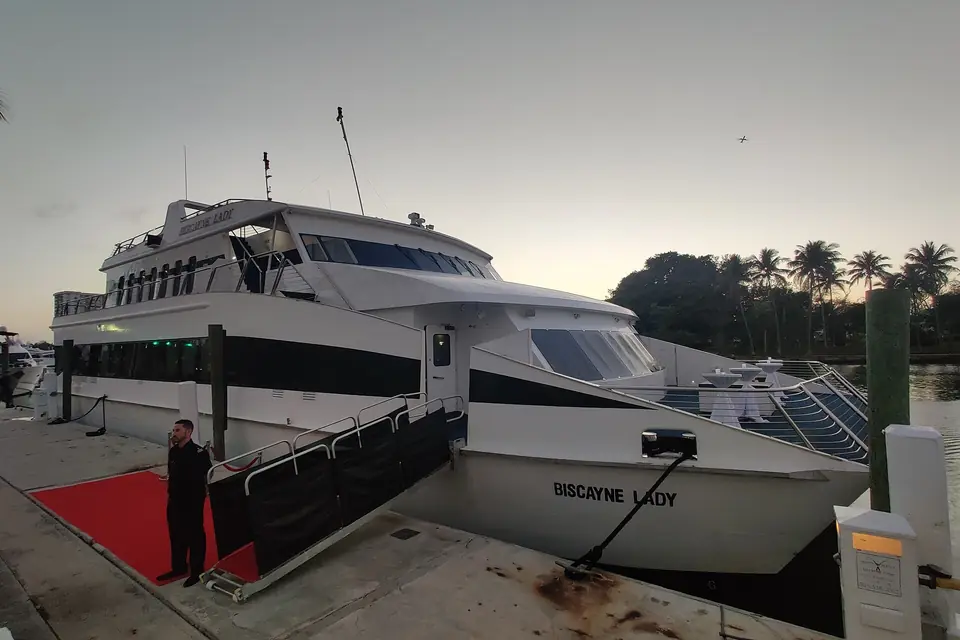 Charter yacht docked in front of a Miami Beach hotel