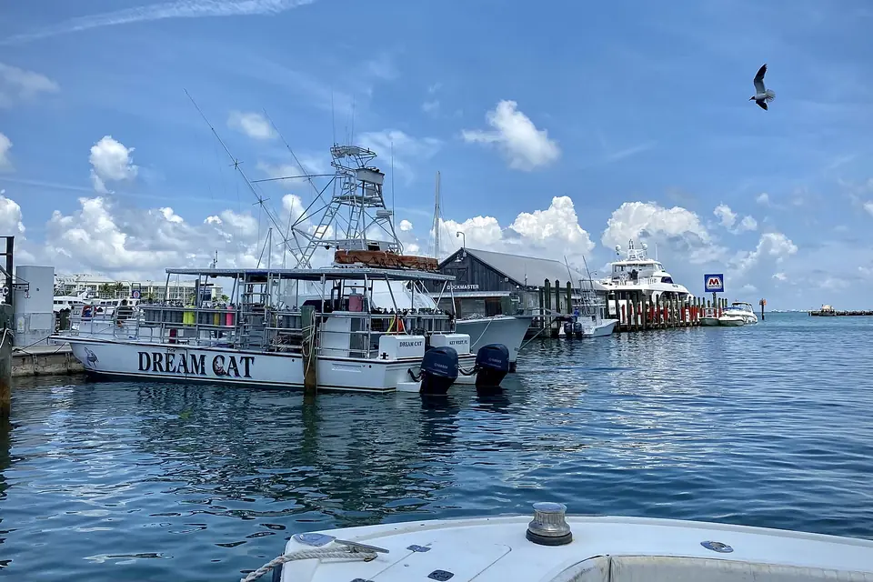 Boats docked under a blue sky at Key West Bight Marina