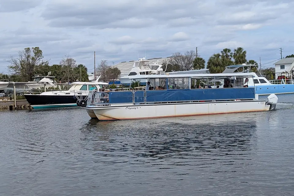 Large pontoon boat on the water in Tarpon Springs, Florida